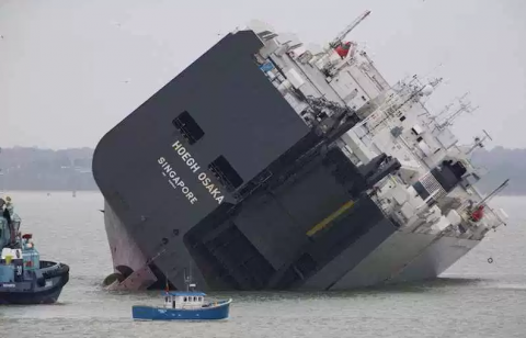 The cargo ship Hoegh Osaka lies on its side The cargo ship Hoegh Osaka lies on its side